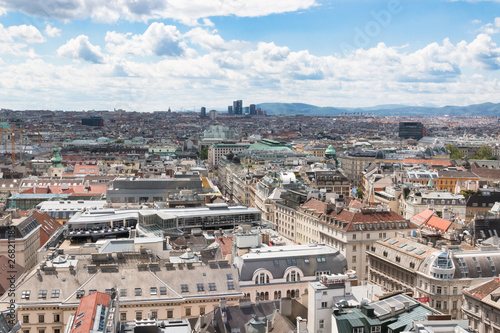 Wien  Austria. May  2019. Panorama of the city from the observation tower of St. Stephen   s Cathedral. Roofs of houses. In the distance  the Alpine Mountains. Sky view.