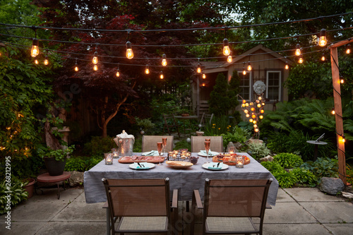 Patio Evening Dinner Party with Champagne photo