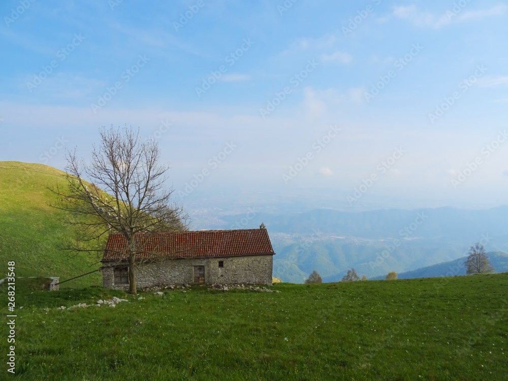 Fototapeta premium The Italian Alps at sunset near the Po valley and the village of Roncola, Italy - May 2019.