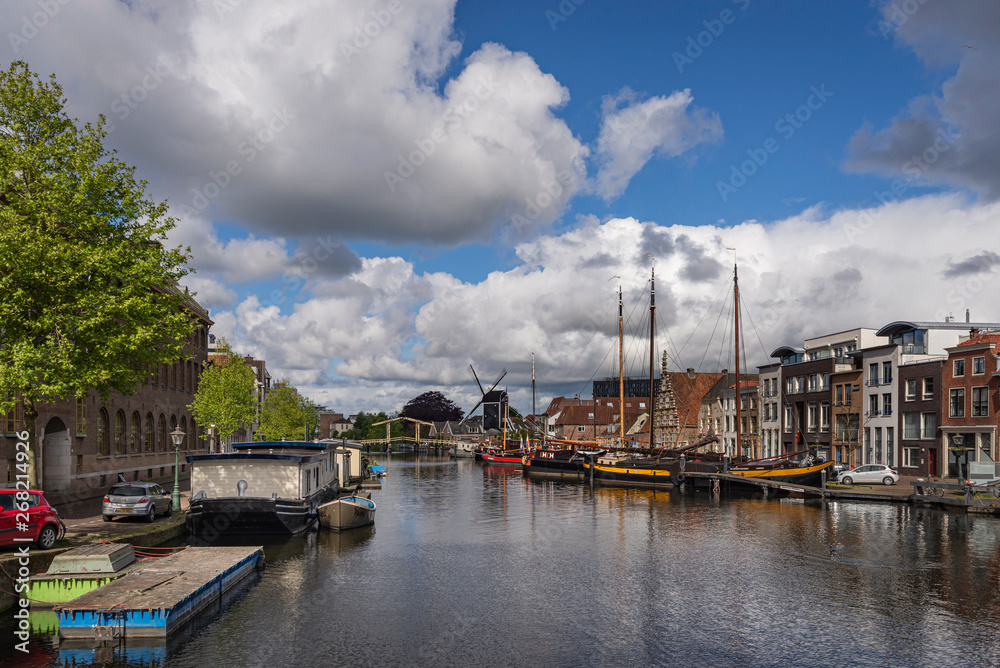 12 May 2019 Leiden, Netherlands, Traditional Dutch facades and canal street after heavy rain