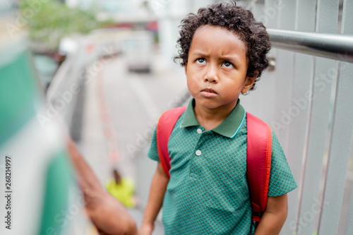 Little boy angry at his father