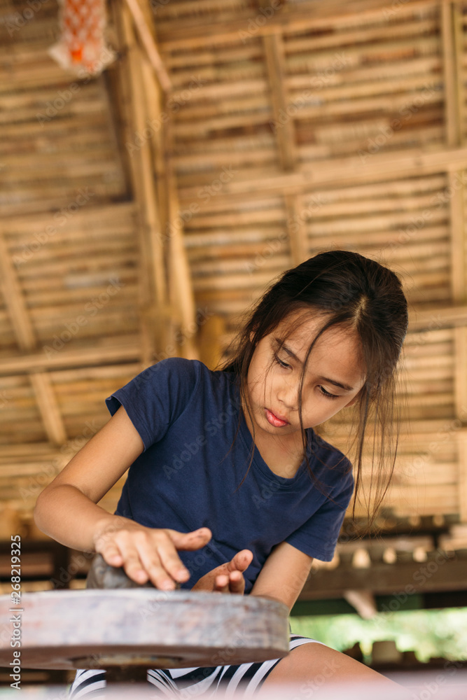 Girl playing with clay at home Girl playing with clay at home