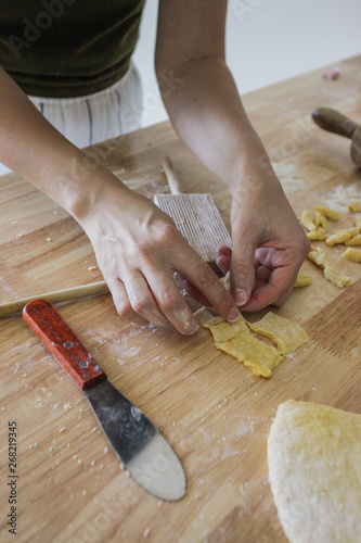 woman making homemade pasta photo