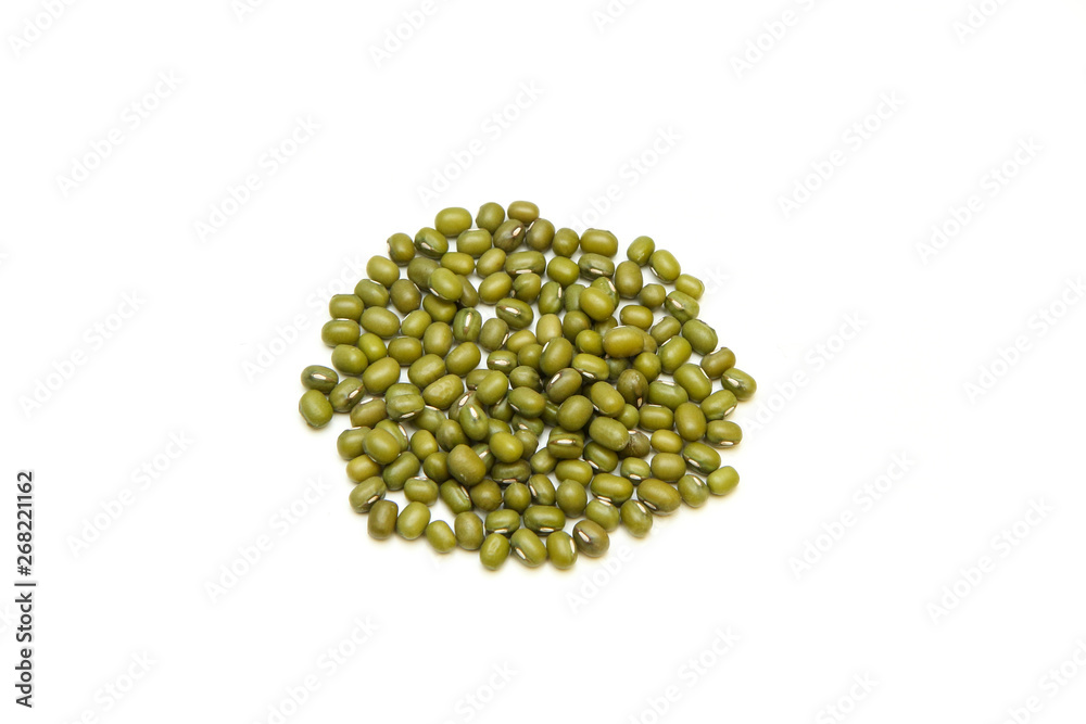The small amount, a pile, of mungo beans isolated on a white background. The small amount, a pile, of mungo beans isolated on a white background.