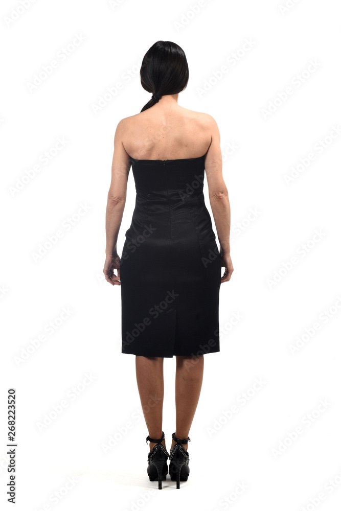 full portrait of a woman from behind with off the shoulder dress on white full portrait of a woman from behind with off the shoulder dress on white