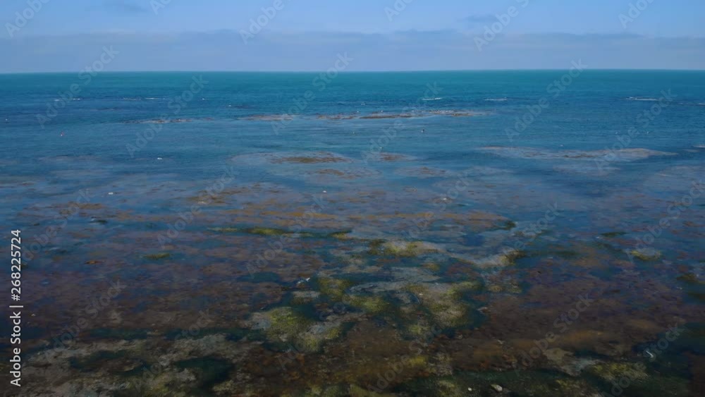 Flying over ocean and Revealing a Monument in Wakkanai - Cape Sōya the Northernmost tip in Hokkaidō, Japan - Aerial shot