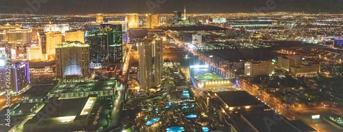 Fotografie Night aerial view of Las Vegas as seen from helicopter