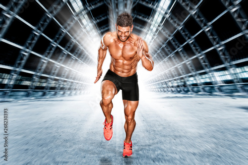 Slika na platnu Muscular Men in Running Motion. Handsome Male Athlete Sprinting