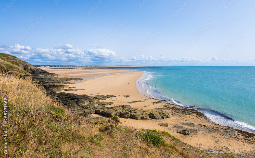 Rocky coast and beach on the Cape Carteret. Normandy, France