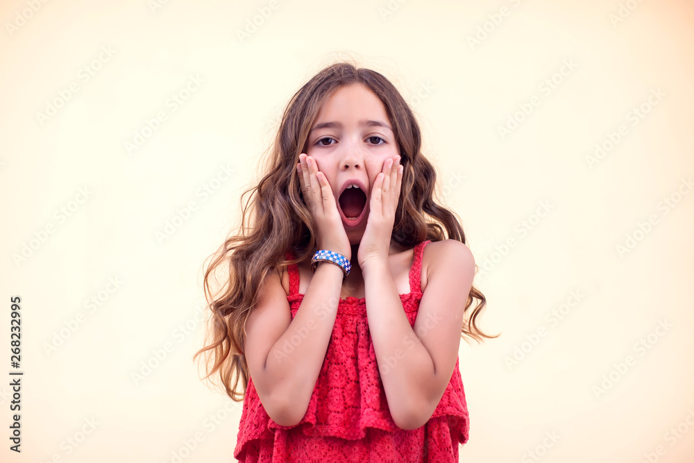 Little girl open her mouth because screamed or surprised about something. Children and emotions concept Little girl open her mouth because screamed or surprised about something. Children and emotions concept