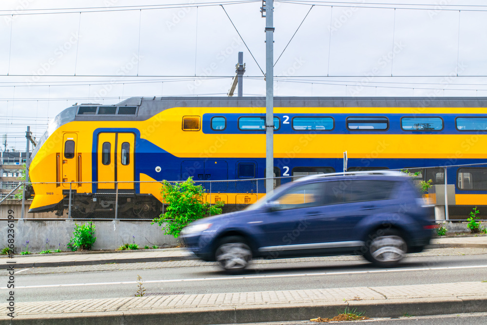 Dutch train with road in foreground