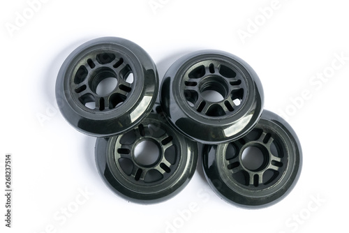 Inline skate wheels, four rollerblade wheels isolated on white background photo