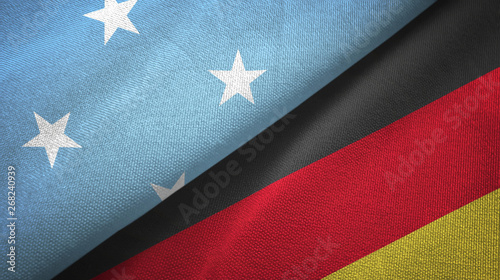 Micronesia and Germany two flags textile cloth, fabric texture
