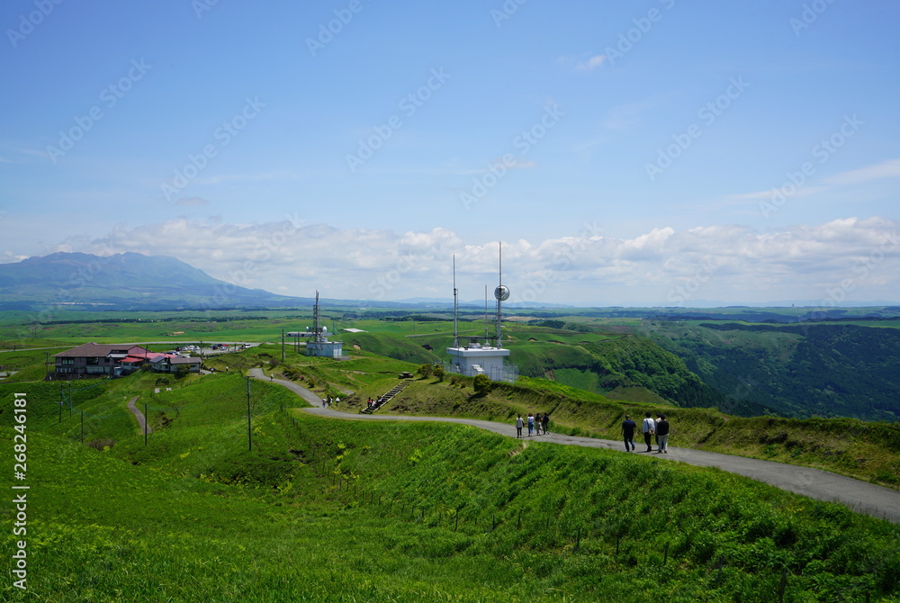 阿蘇山の大観峰に造られたデジタルテレビ中継局、春の阿蘇山大観峰の風景 StockFoto Adobe Stock