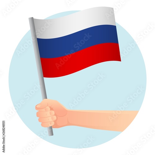russia flag in hand