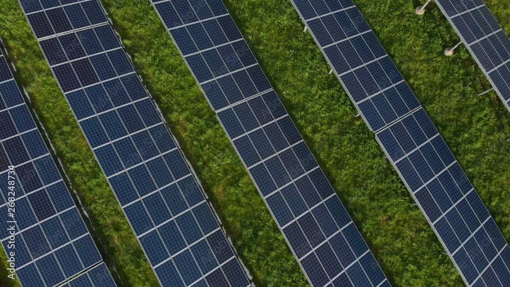 renewable energy: modern solar panels and wind turbines (aerial view) renewable energy: modern solar panels and wind turbines (aerial view)