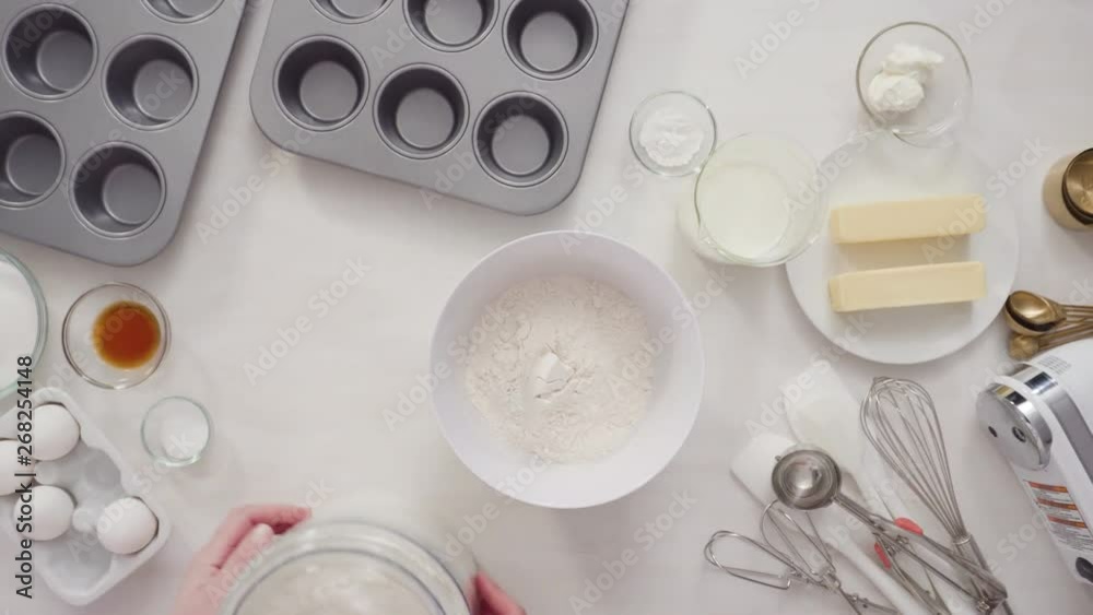 Flat lay. Step by step. Craking white organic eggs into a small glass bowl. Flat lay. Step by step. Craking white organic eggs into a small glass bowl.