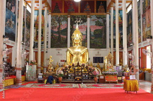 Sisaket Province, Thailand - March 30, 2014: Make a merit at the temple Wat Maha Phuttharam (Wat Phra Toh)