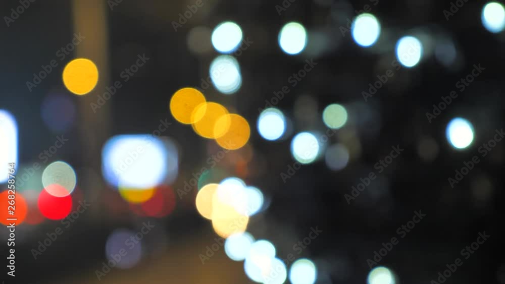 Defocused christmas lights bokeh. abstract motion background Defocused christmas lights bokeh. abstract motion background