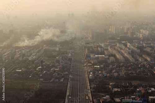 Fototapeta Naklejka Na Ścianę i Meble -  The city was enveloped in heavy smog