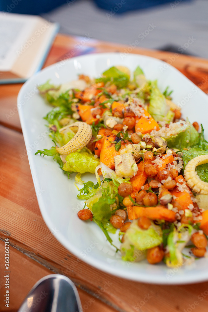 Vegetarian lunch: salad with quinoa, mini-corn and chickpea