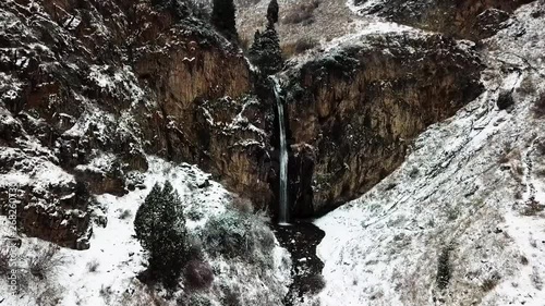 Kegety Waterfall in winter near the Ala-Too range near Kegety River a great day hike past Tokmok from Bishek. Road Trip in Central Asia and Kegety Gorge. Waterfall in Kyrgyzstan photo