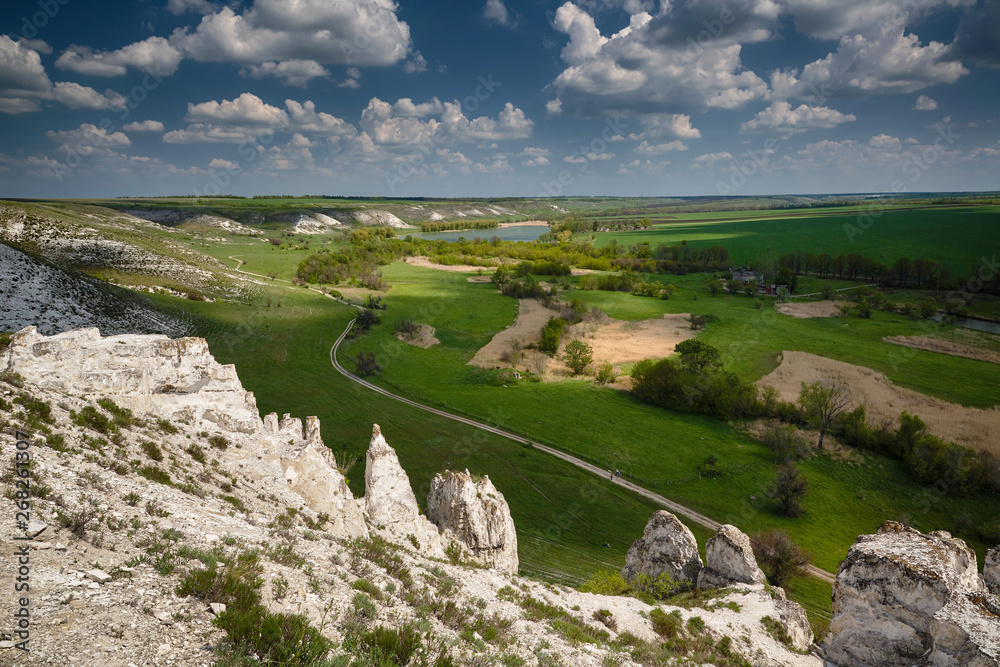 Landscape with Chalk cliffs. Late Cretaceous. Landscape with clouds.