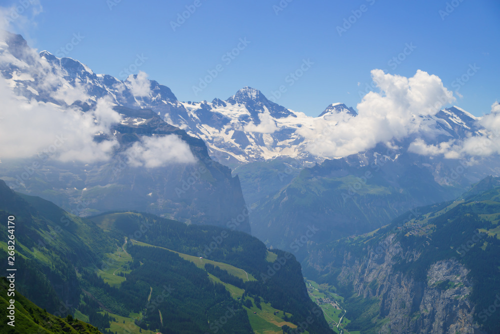 Alpine peaks landskape. Lauterbrunnen, Jungfrau, Bernese highland. Alps, tourism, journey, hiking concept.