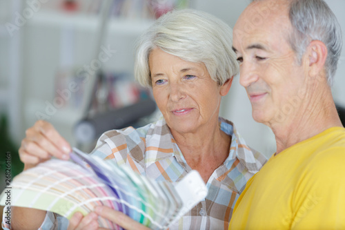 elderly couple with a color swatch
