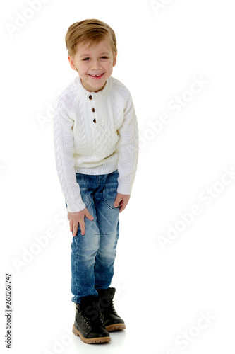 Handsome little boy laughing. © lotosfoto