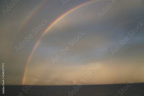 Fototapeta Naklejka Na Ścianę i Meble -  Double Rainbow over the sea