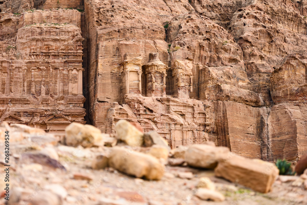 (Selective focus) Stunning view of a huge temple carved in stone in the beautiful Petra site. Petra is a Unesco World heritage site, historical and archaeological city in southern Jordan.