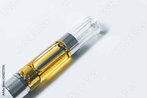 Electronic vape pen (cartridge). THC/CBD Cannabinoid Extract Liquid
