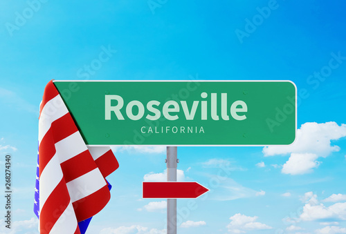 Roseville – California. Road or Town Sign. Flag of the united states. Blue Sky. Red arrow shows the direction in the city photo