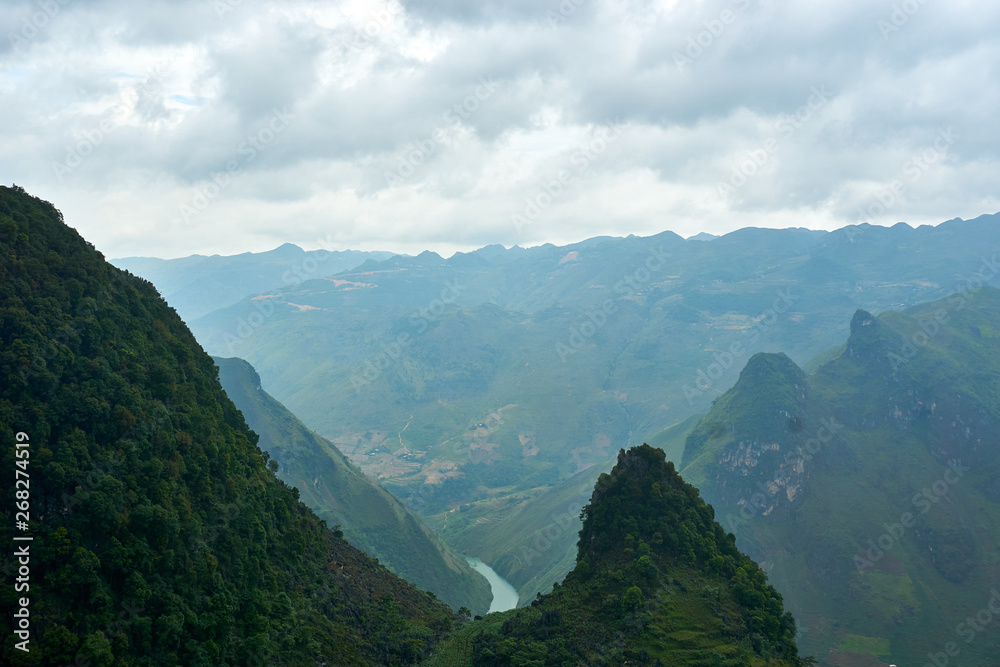 Naklejka premium River Mountain landscape north Vietnam. Beautiful view on the Ha Giang loop on the north of Vietnam. Motorbike trip