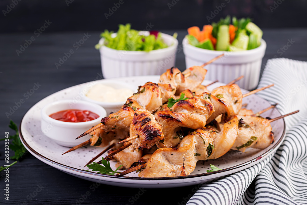 Chicken shish kebab. Shashlik - grilled meat and fresh vegetables. Chicken shish kebab. Shashlik - grilled meat and fresh vegetables.