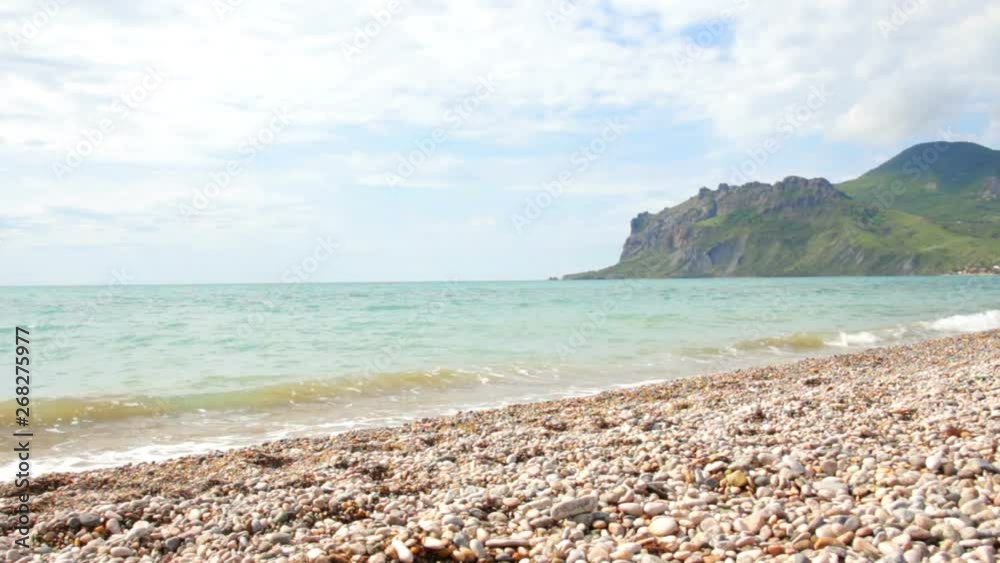 The girl runs along the beach. Woman trains in nature. The girl runs along the beach. Woman trains in nature.