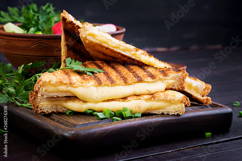 American hot cheese sandwich. Homemade grilled cheese sandwich for breakfast.
