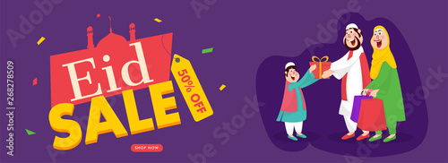 Cartoon character of Islamic couple wishing and giving gift to a child on occasion of Islamic Festival Eid Mubarak.