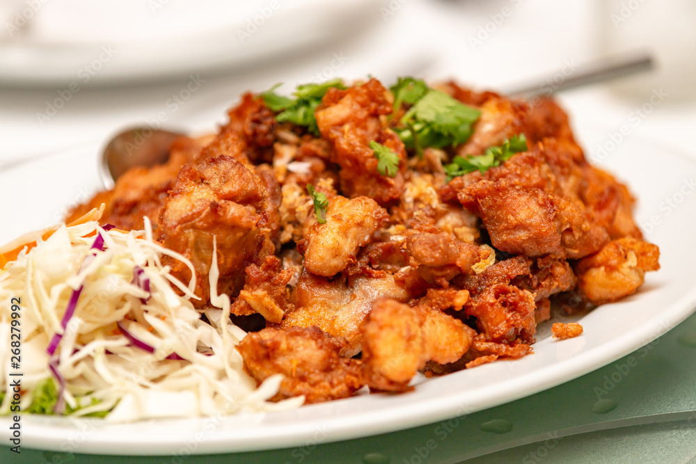 Crispy fish fillet on a white plate,Thailand food Crispy fish fillet on a white plate,Thailand food