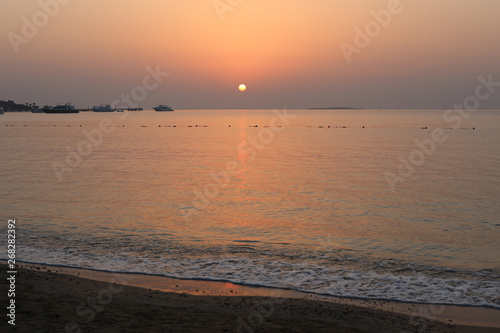 Sunrise in the Red Sea. Reflection of rays of sun light in the morning. Positive inspirational illustration great for your backdrop of layout.