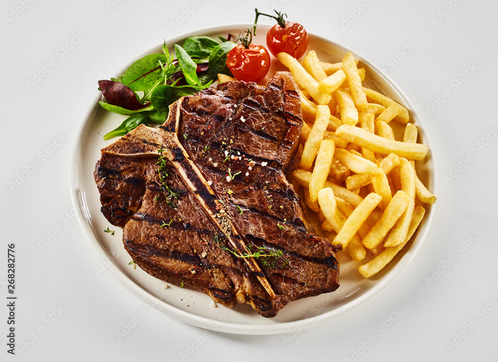 Grilled T-bone steak with French Fries Grilled T-bone steak with French Fries