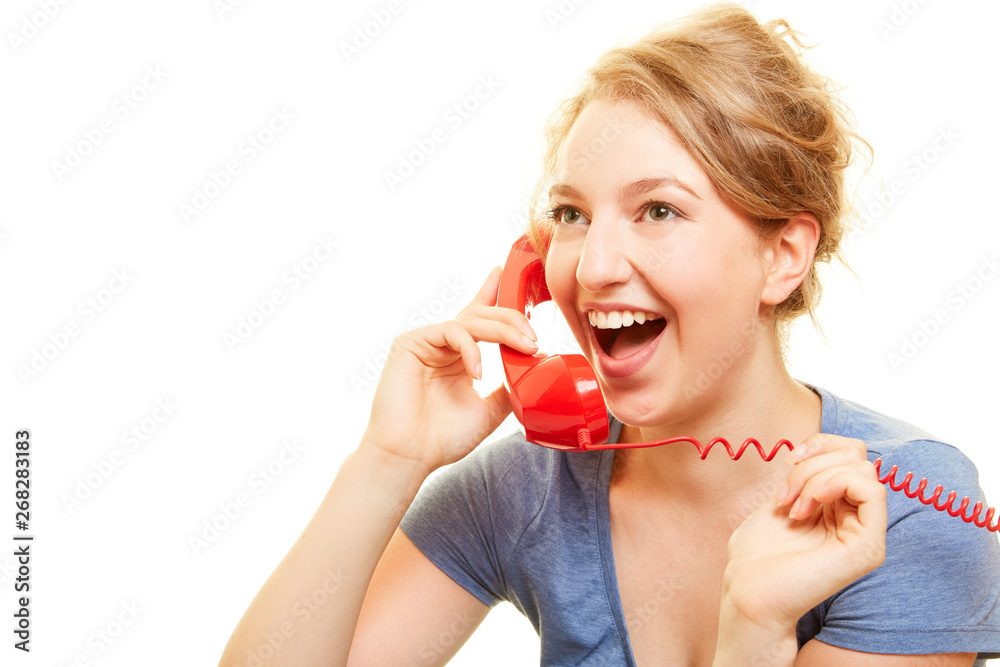 Junge Frau am Telefon lacht wegen Überraschung Stock Photo Adobe Stock
