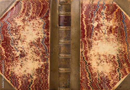 Foto antique leather bound book