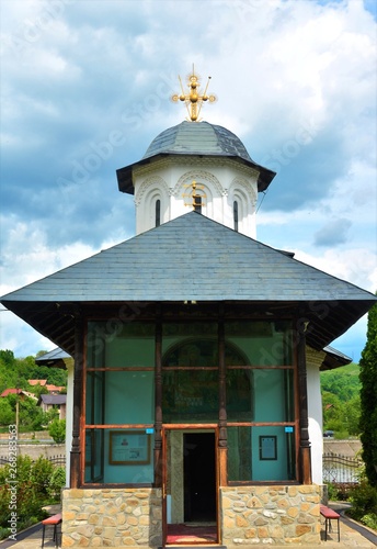 the Ostrov monastery in Calimanesti city - Romania 12.May.2019 is an Orthodox monastery built on an island on the Olt River photo