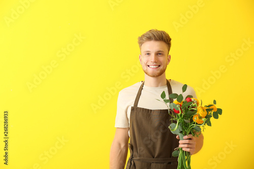 Handsome florist on color b...