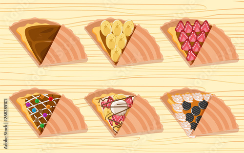 crepes and ingredients on the wooden table
