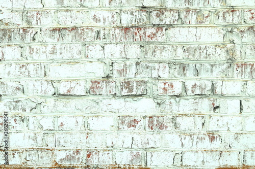 old shabby wall of green brick color as abstract background in loft style
