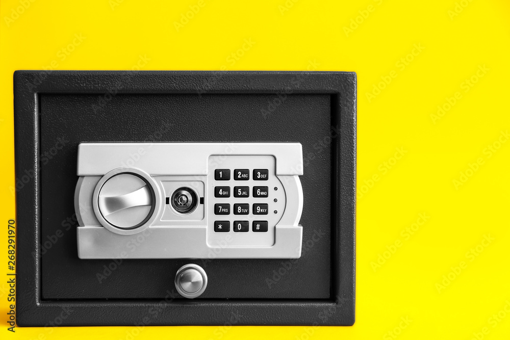 Modern safe on color background Modern safe on color background