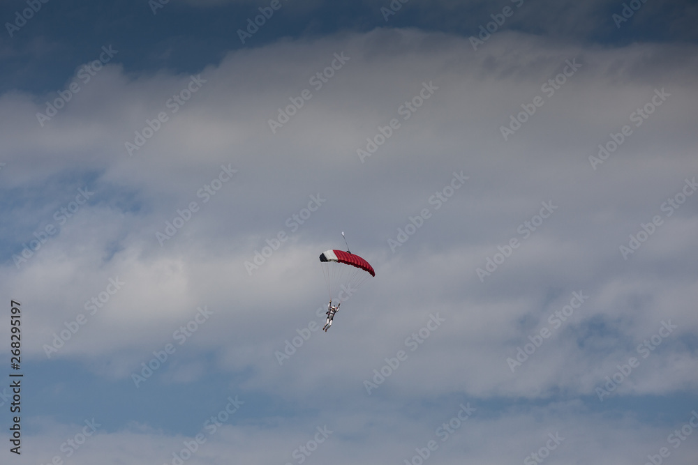Skydive, people in the sky, under clouds Skydive, people in the sky, under clouds